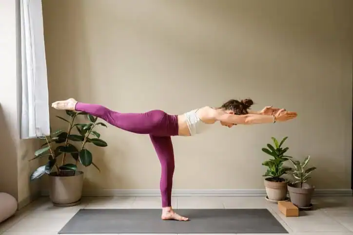 Achieving the Perfect Tone: How Often Should You Exercise for Results? 1 Woman doing Yoga exercise Maplehurst to help with toning the body.
